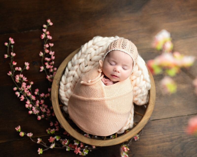 Sweet springtime styling with soft peach tones and blooming florals.