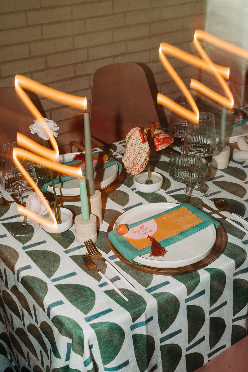 Flash photography of a colorful, patterned wedding table at South Congress Hotel.