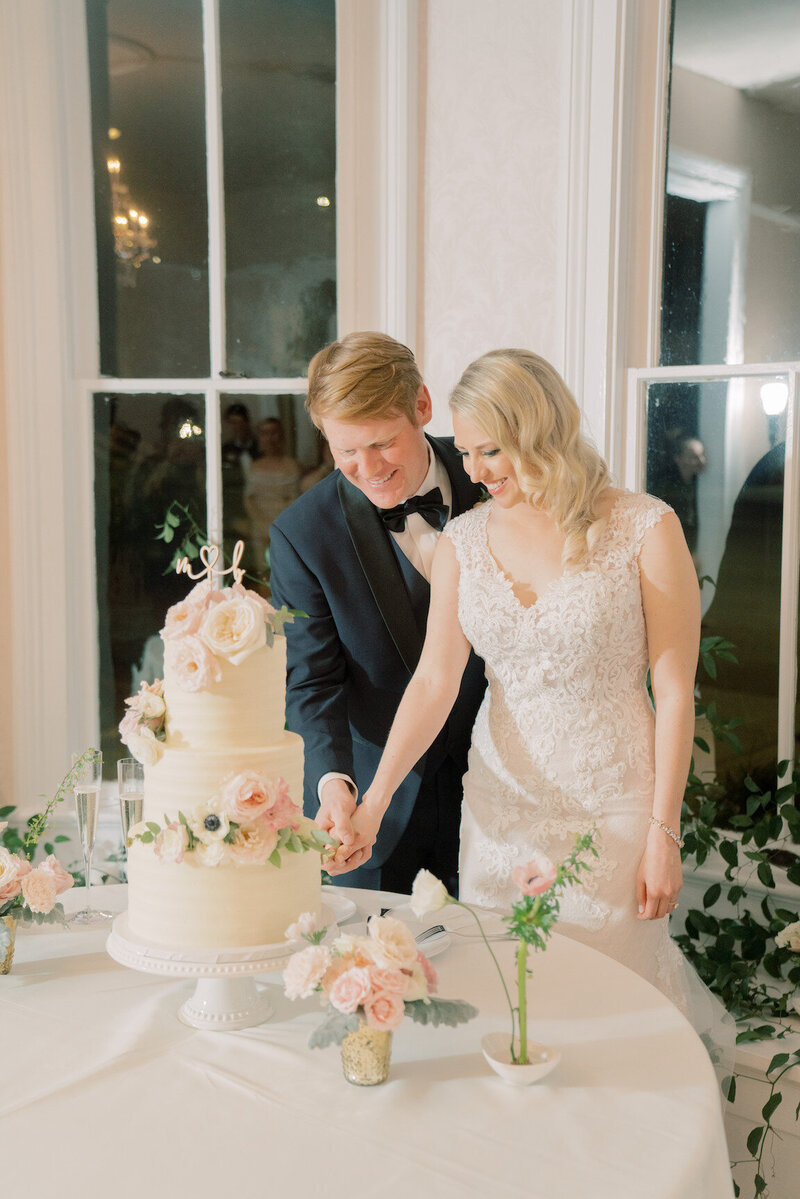 Evening wedding reception under string lights in The Allan House courtyard