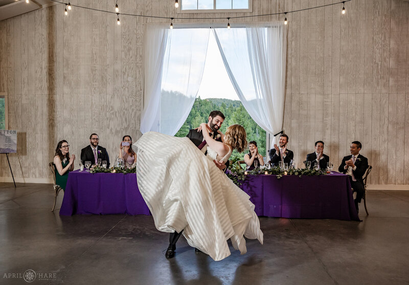First Dance Inside the Woodlands Barn Wedding Reception in Colorado Mountains