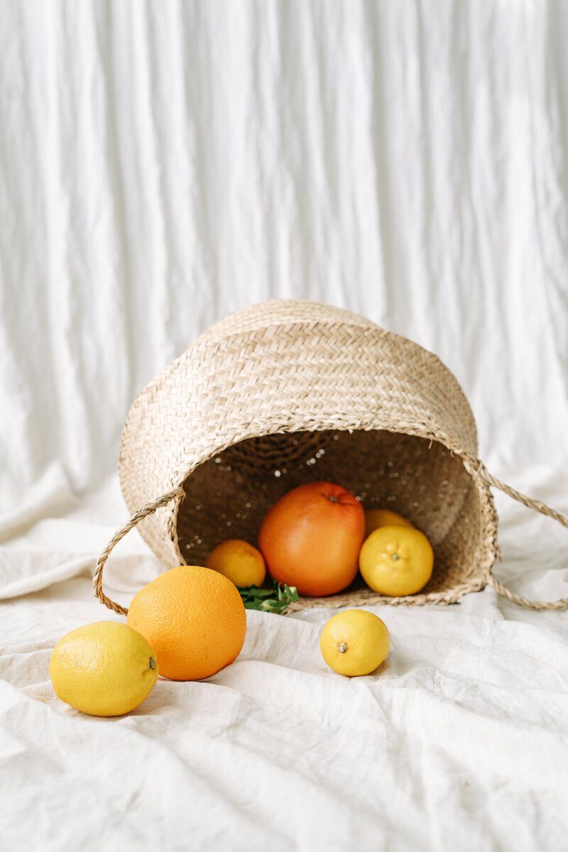 Lemons falling out of a basket