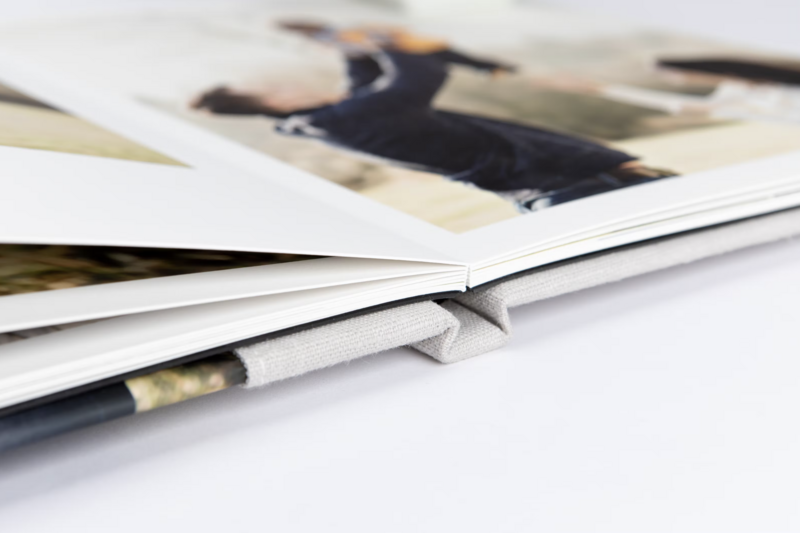 Beautiful wall gallery of 3 framed photos in a modern living room. Photographs taken by San Antonio family photographer Cassey Golden.
