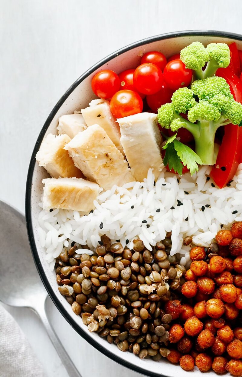 Close-up of a vibrant and healthy meal in a bowl, featuring fresh ingredients for balanced nutrition and meal prep.