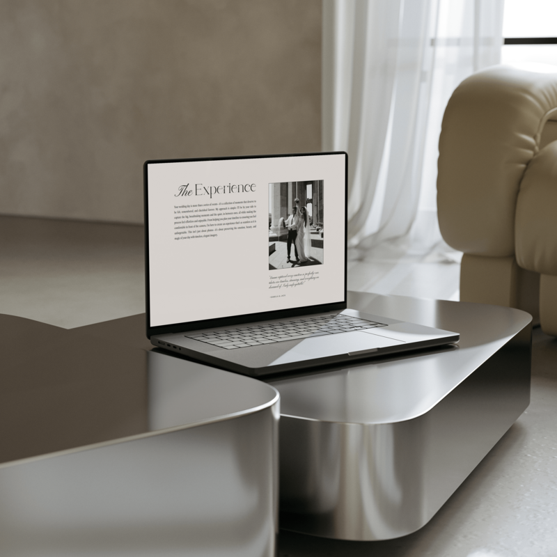 Laptop on table of photographer website