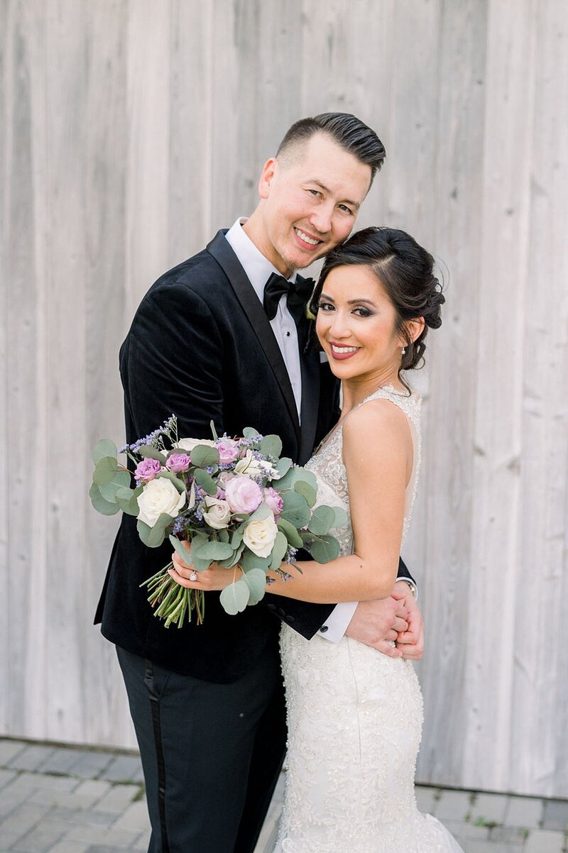 Bride and groom walk up memorial steps at their DC wedding
