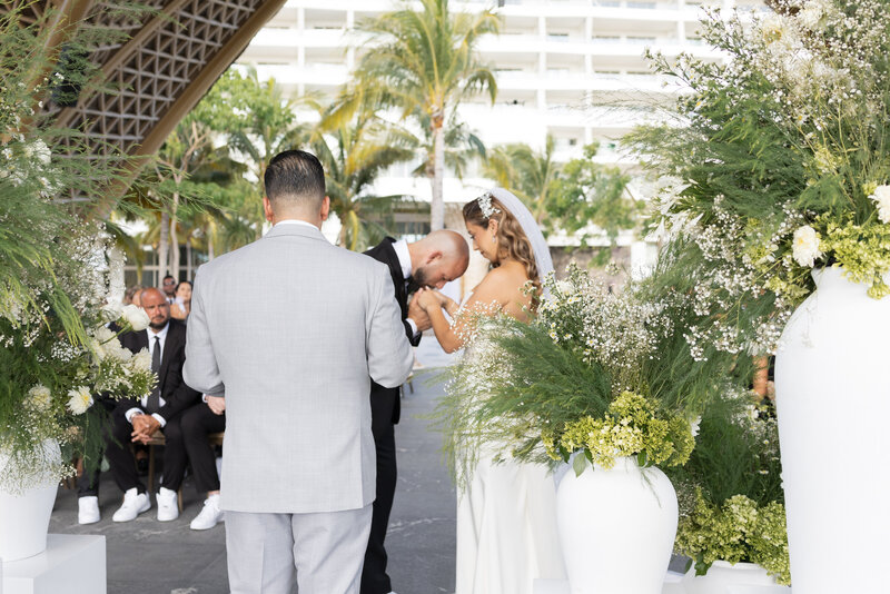 bride-and-groom-running-away