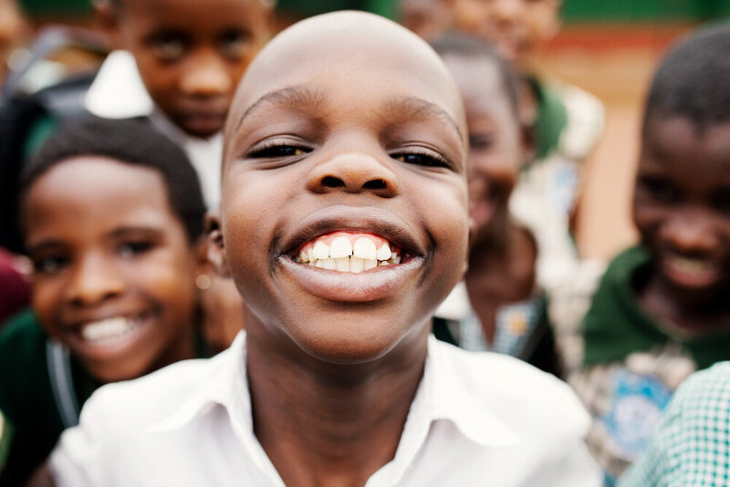 smiling boy showing his teeth