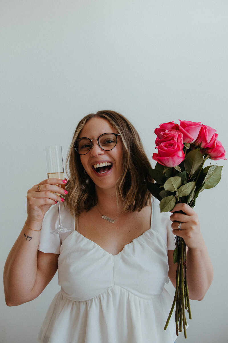Full service event planner, Rachel, smiles at a wedding reception near Eugene, Oregon. 