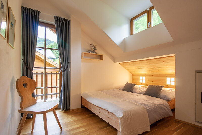 Schlafzimmer in einer Ferienwohnung in Pinzgau. 