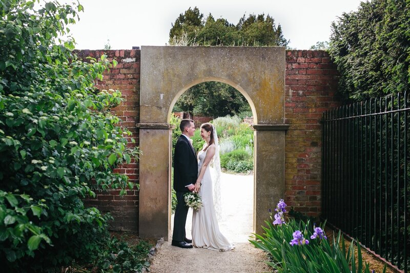 Romantic bliss: Bride and groom in Saffron Walden Ornamental Gardens.