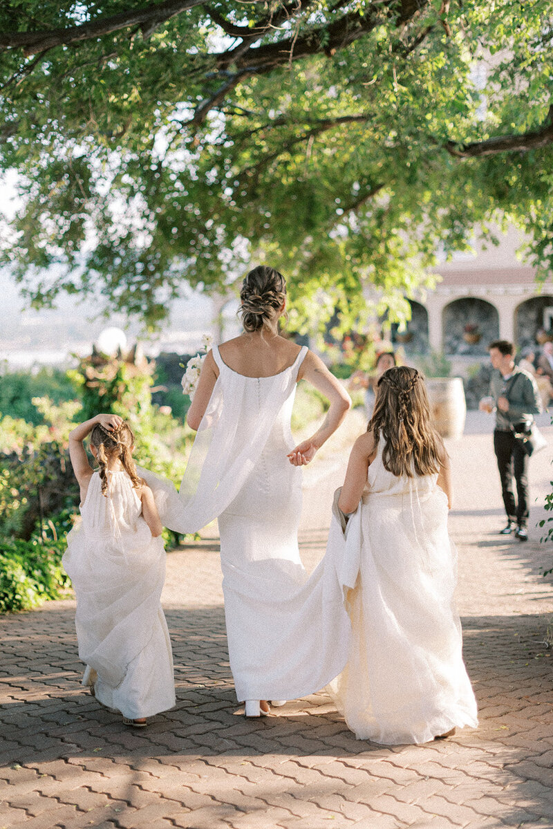 Bride and groom walk up memorial steps at their DC wedding