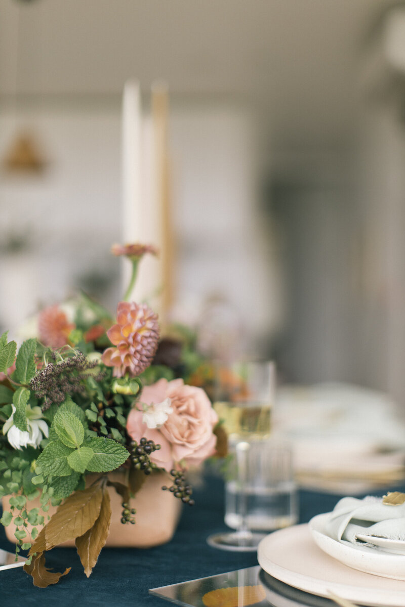 Floral designed on table at wedding in granbury by Kendra's Events