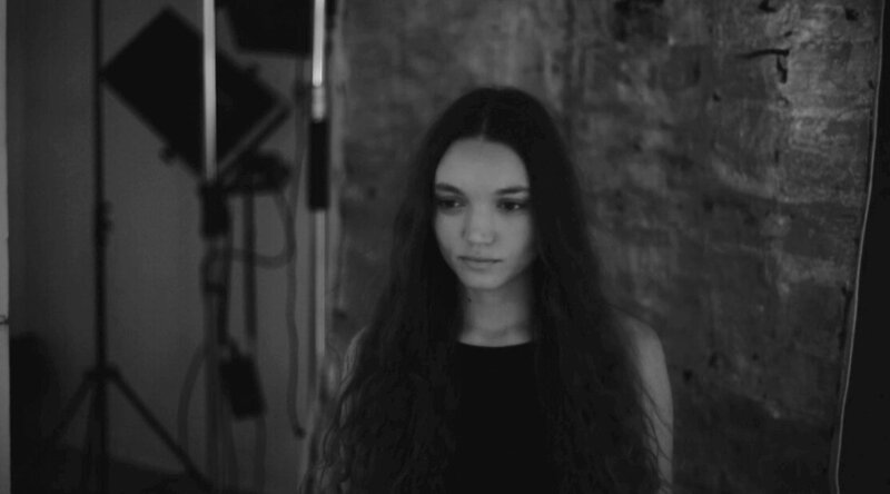 behind the scenes snapshot of a woman in a photography studio