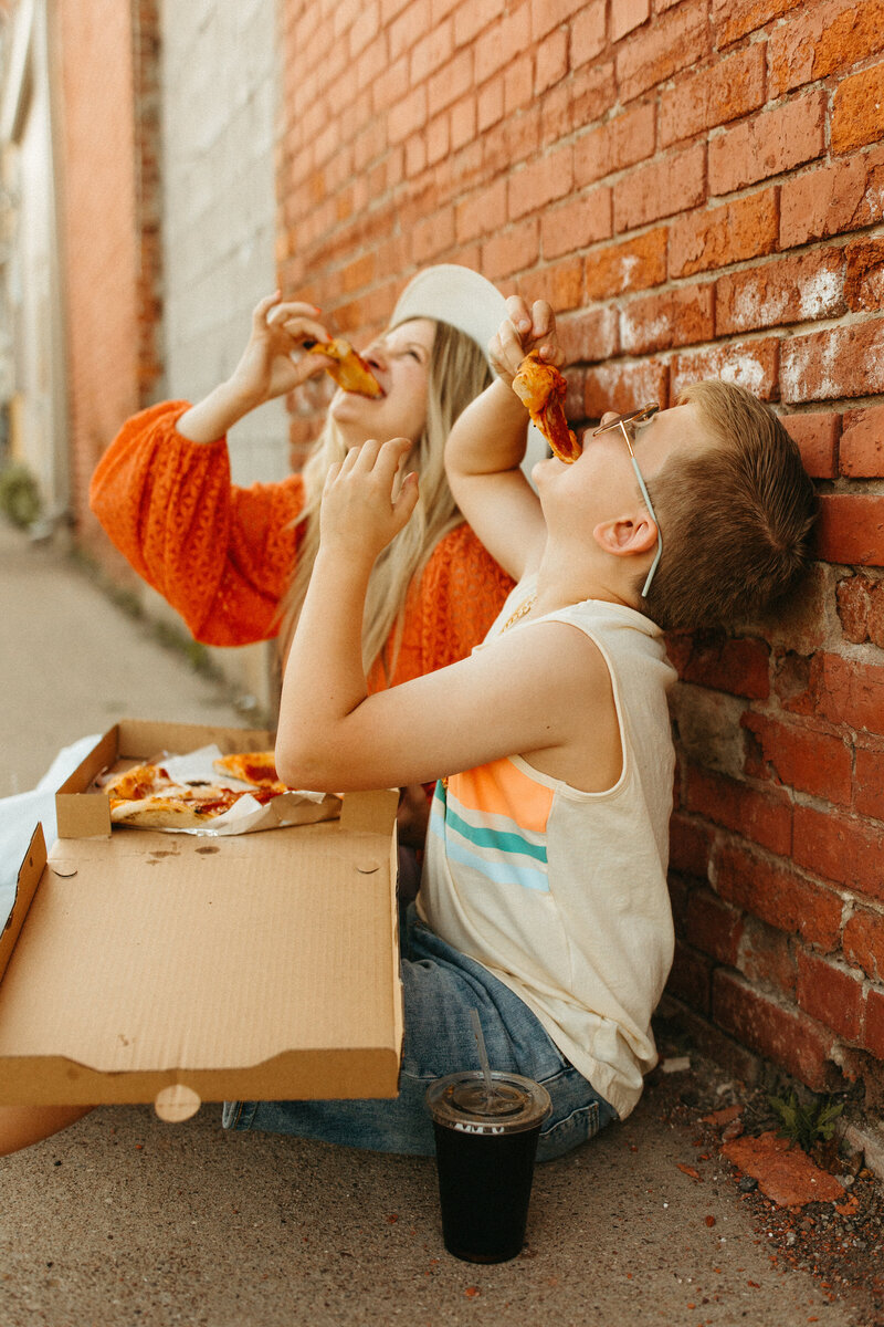 a couple kissing in the windy mountain landscape