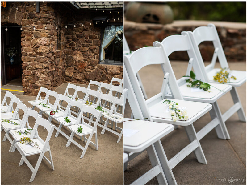 White Wedding Chairs with Flowers on them Set up for Ceremony on the Fireside Patio at Boettcher Mansion