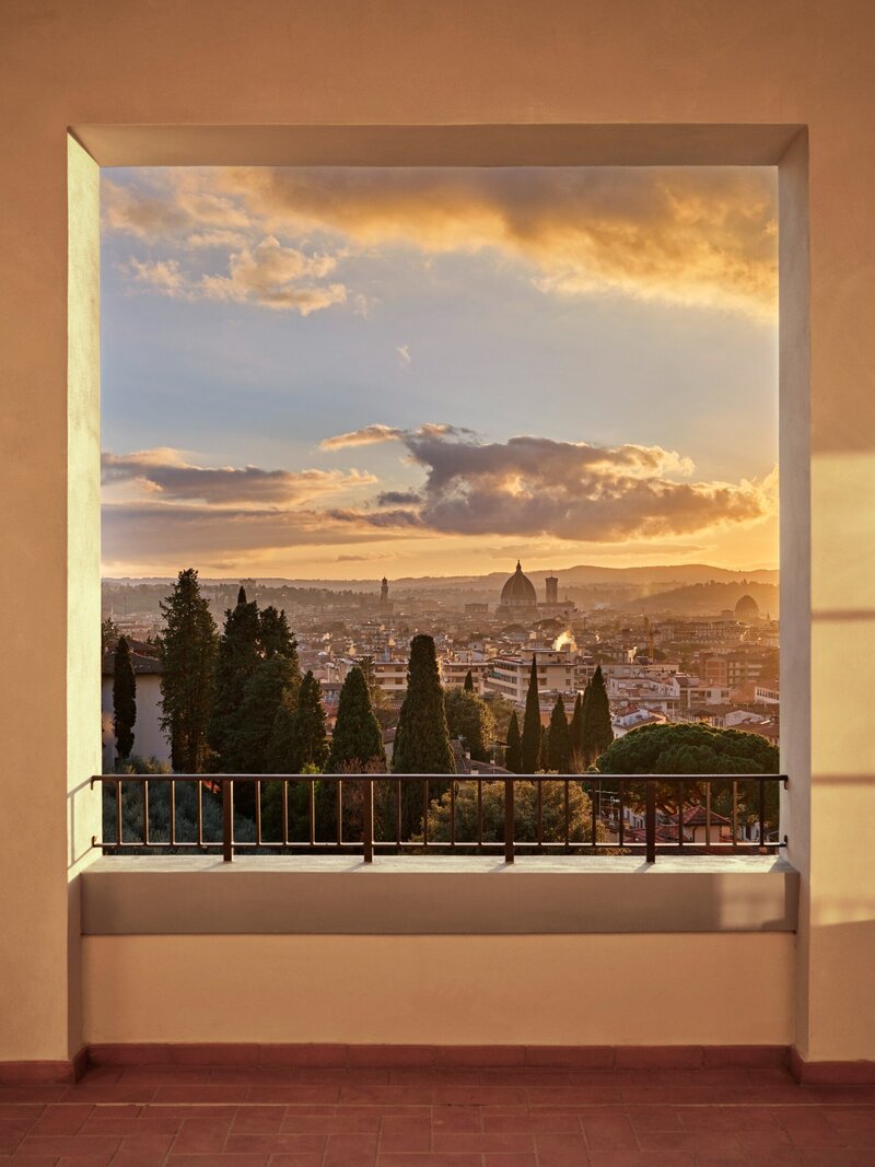 Romantic sunset out a window in Florence Italy