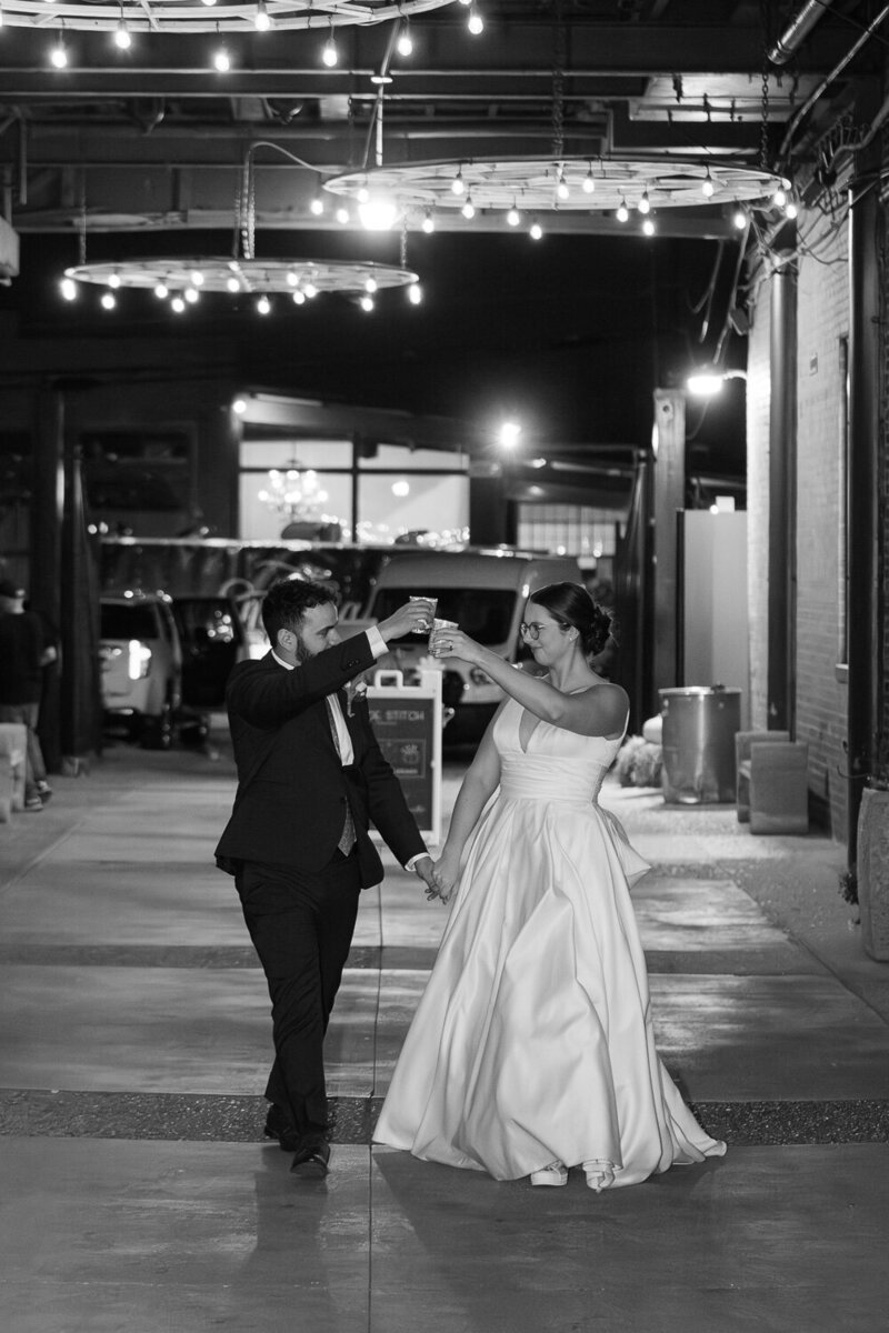 black-and-white-cheers-wedding-couple-1