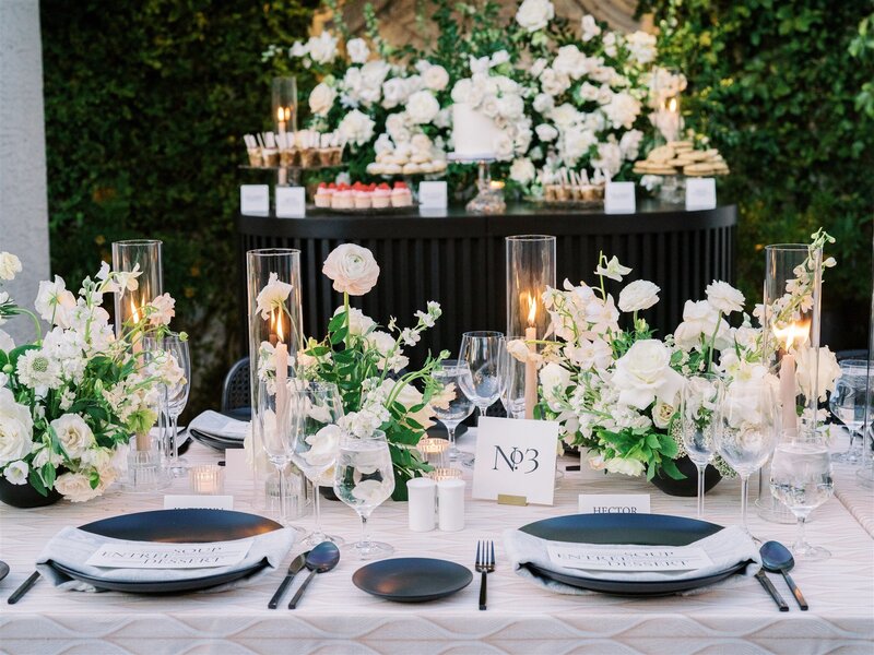 classic wedding table setting with gold flatware