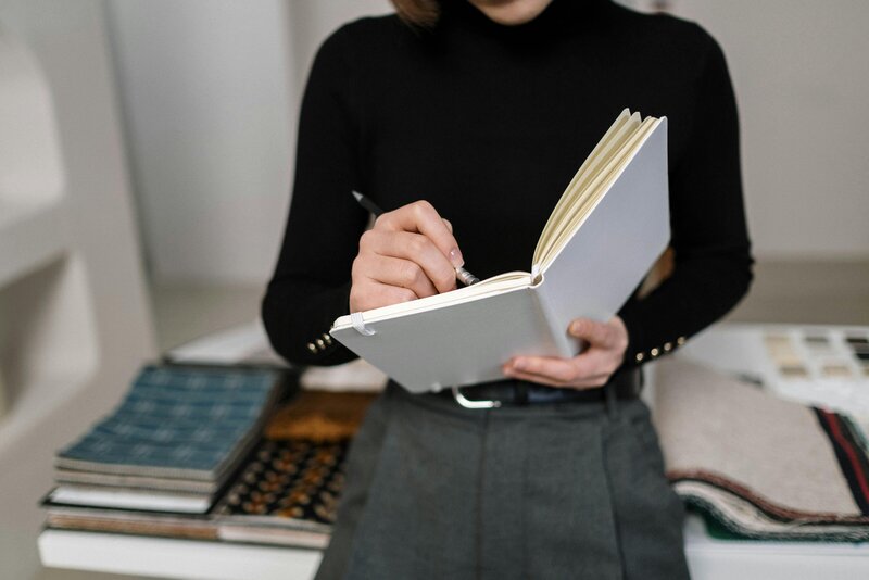interior designer writing down notes