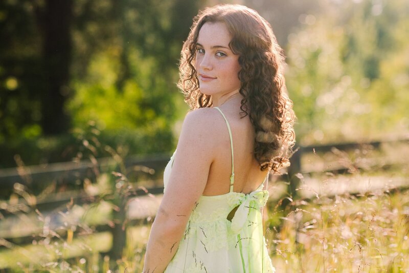 Senior Girl Looking over Shoulder