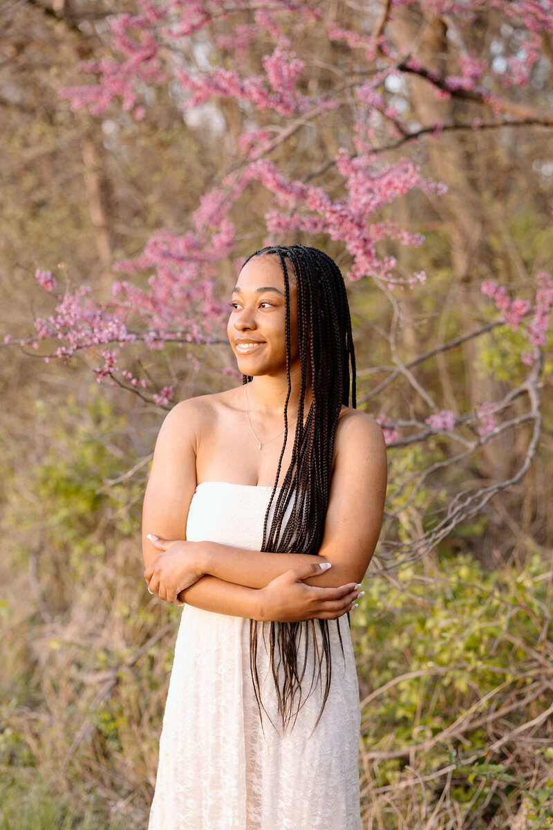 girl poses for senior photos