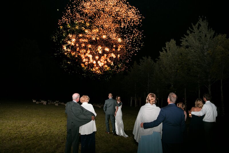 Guests watching fireworks | Wedding Photography