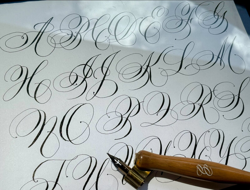 alphabet and pen