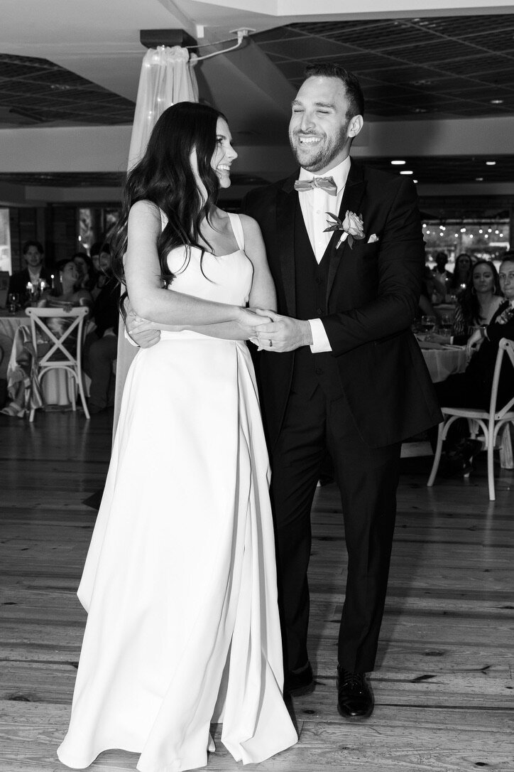 Bride and groom's dance in their wedding in front of guest