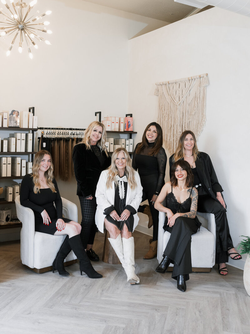 team of female hair stylists in upscale hair salon
