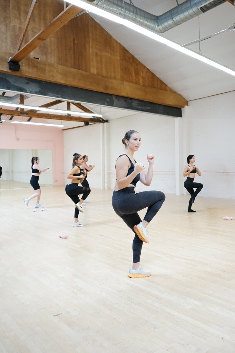 Women working out at the cardio sculpt class at bellaTec studio in downtown Los Angeles.
