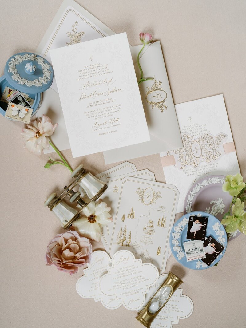 a flat lay of items for a purple wedding