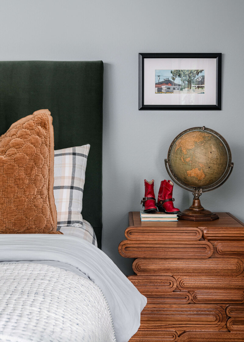 a very modern looking nightstand in a  bedroom