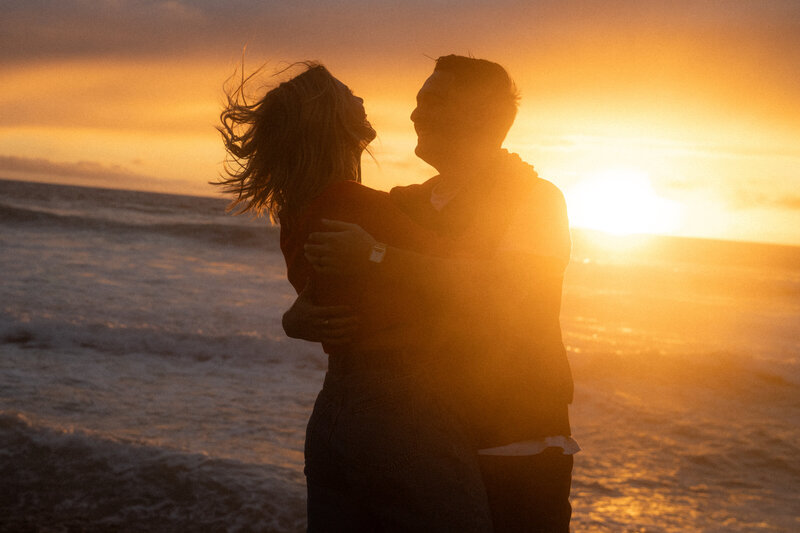 golden hour on the west coast encompasses couple in love