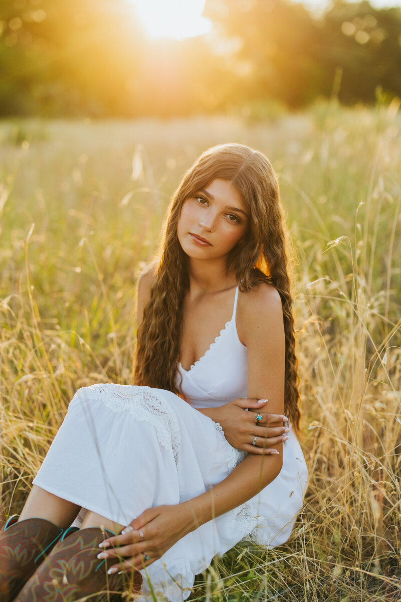 Sunlit senior portrait by Tri Cities photographer