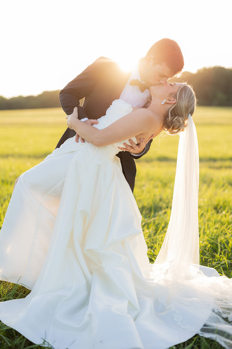 Bride and groom at wedding on family land in Senoia, GA