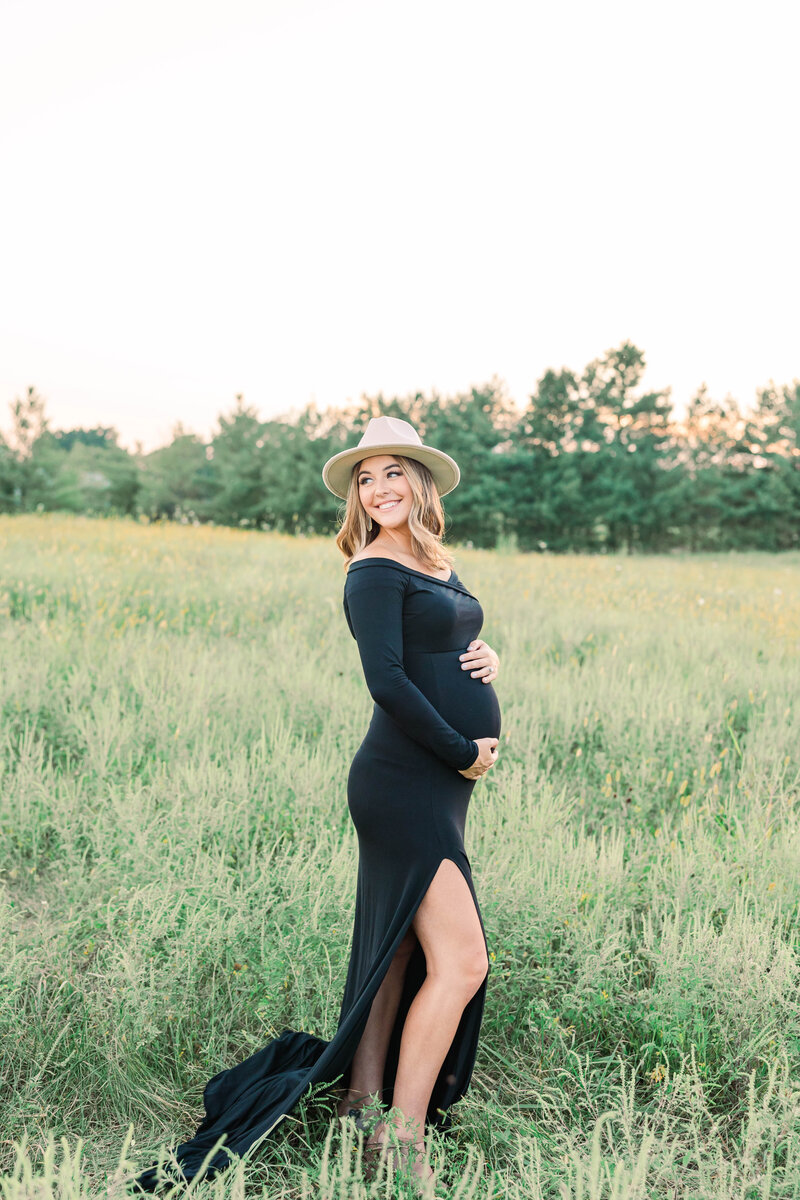 Beautiful maternity photography in Harrisonburg, VA, with natural light highlighting the joy of pregnancy