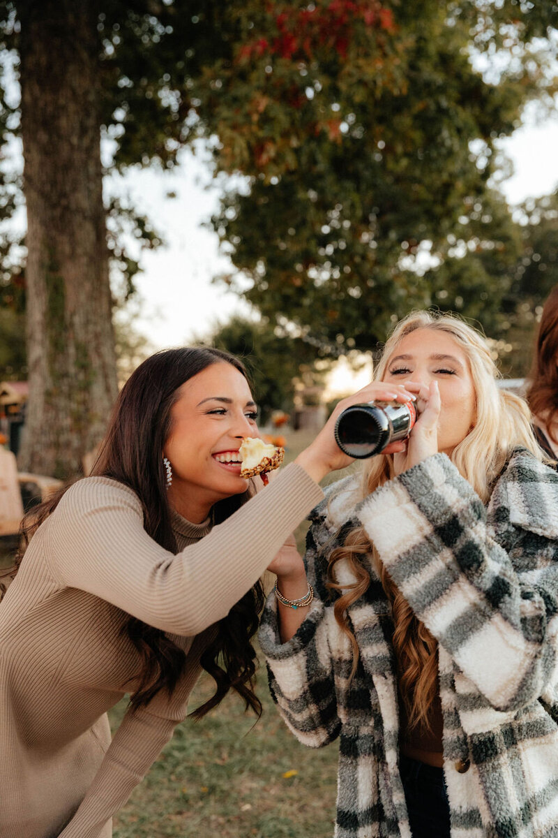 girls laughing with food