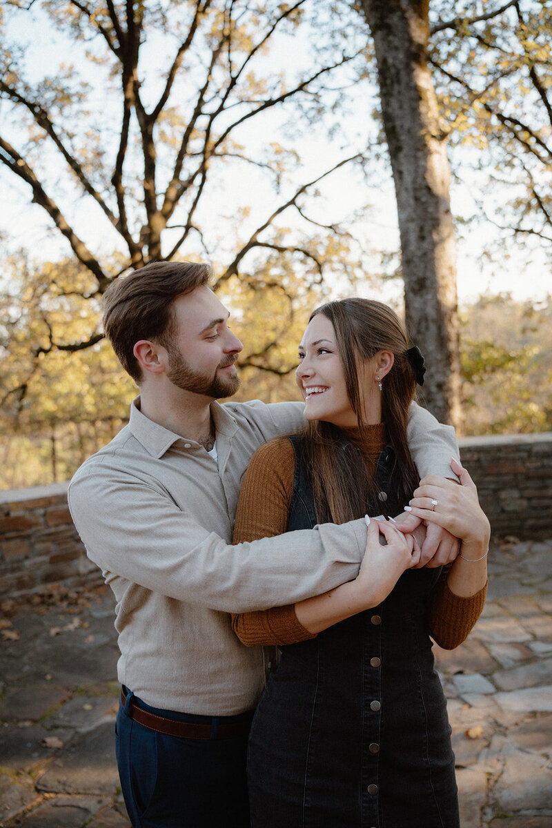 photo of a newly engaged couple posing in Little Rock, Arkansas
