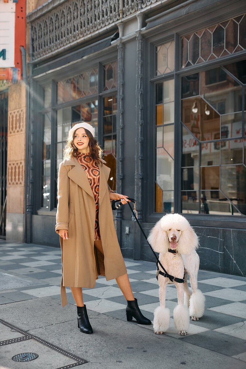 Senior girl and white poodle for senior portraits in Downtown Los Angeles, California