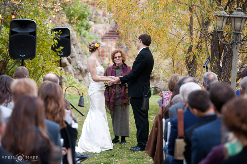 Couple at their fall wedding ceremony at Boulder Creek Wedgewood Weddings