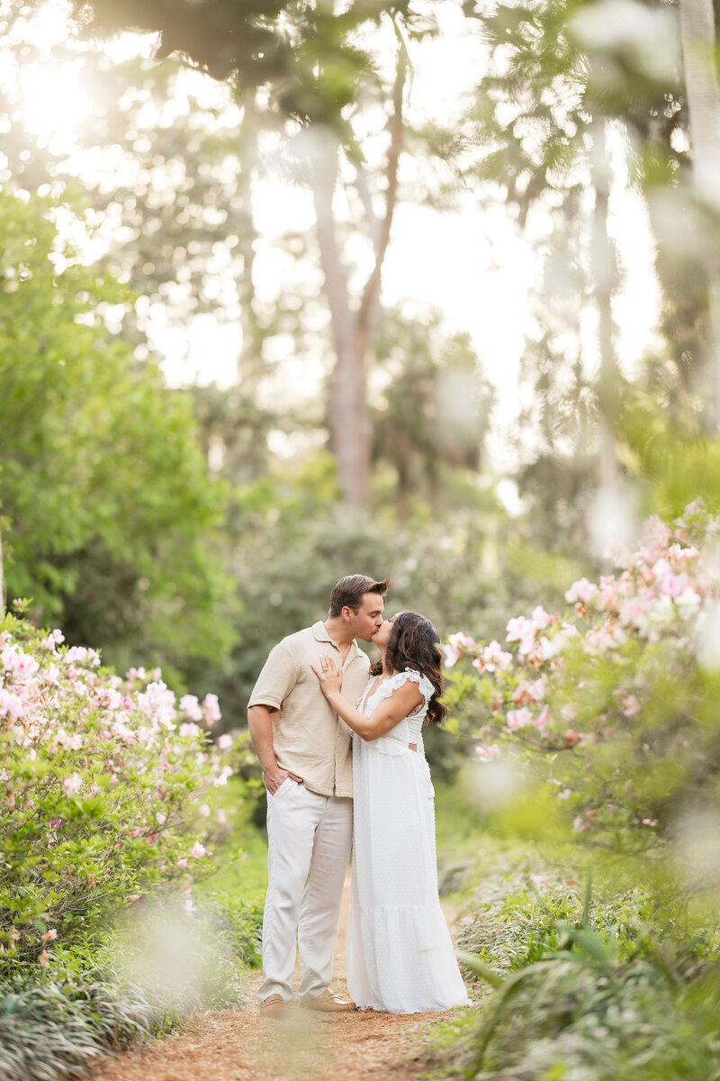 Close and candid photo of a couple kissing during an intimate North Florida engagement session.
