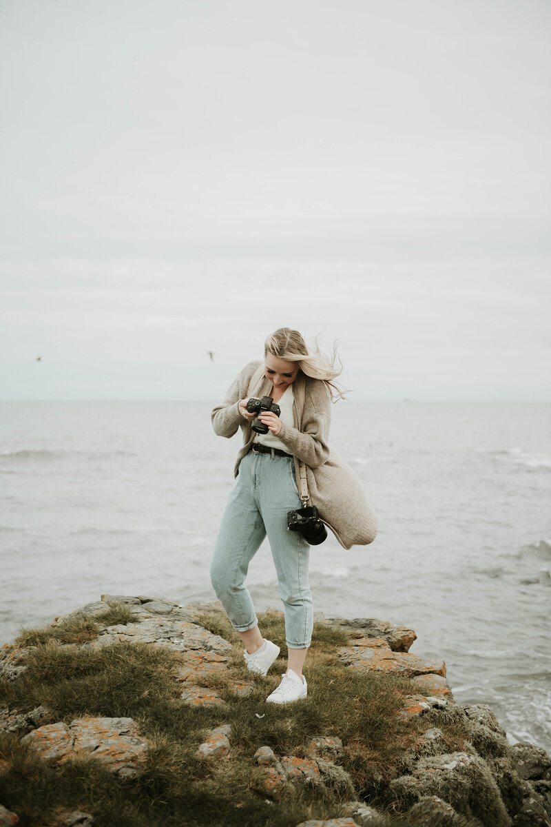 sophie-near-the-ocean-with-camera