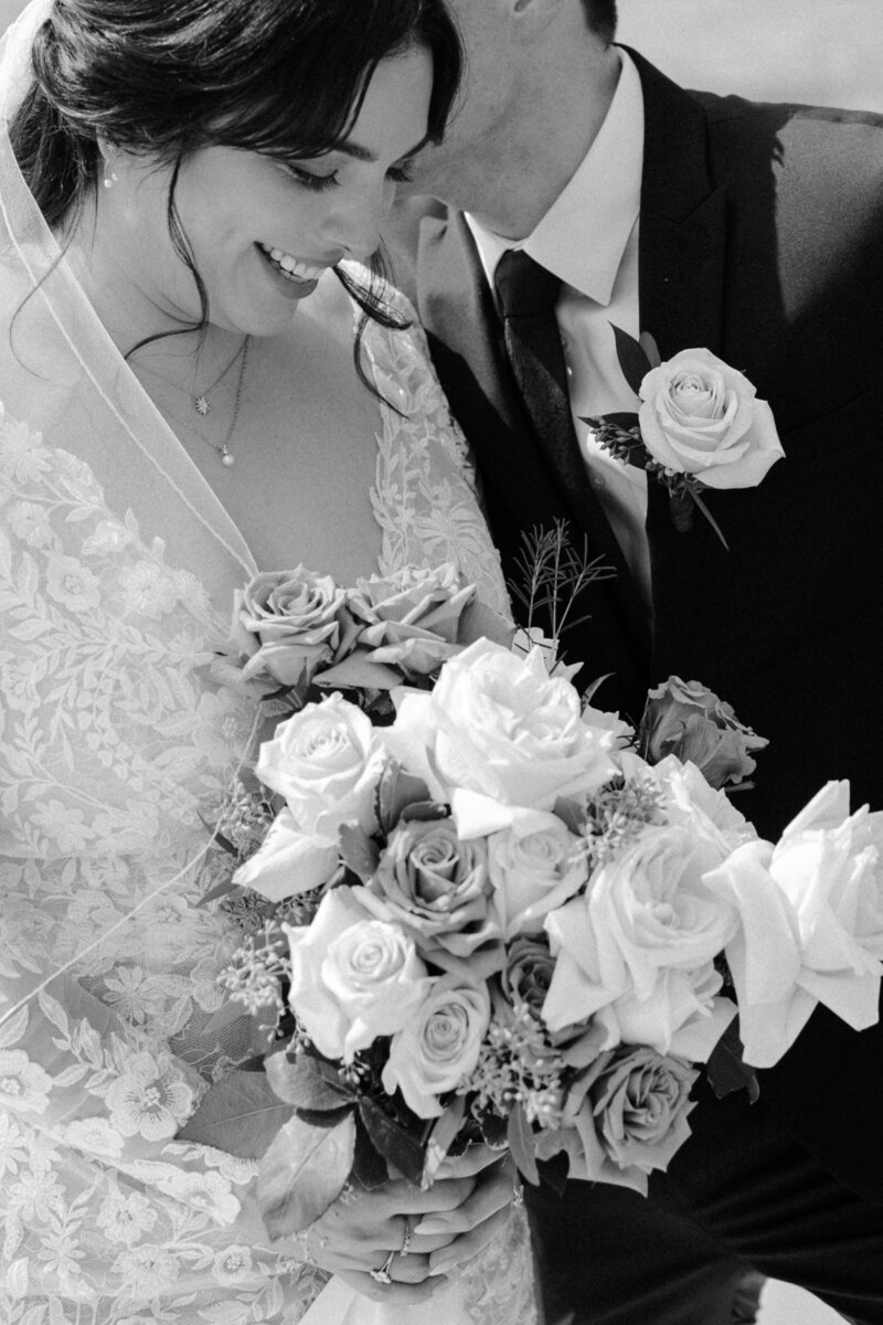 groom leaning in to kiss bride