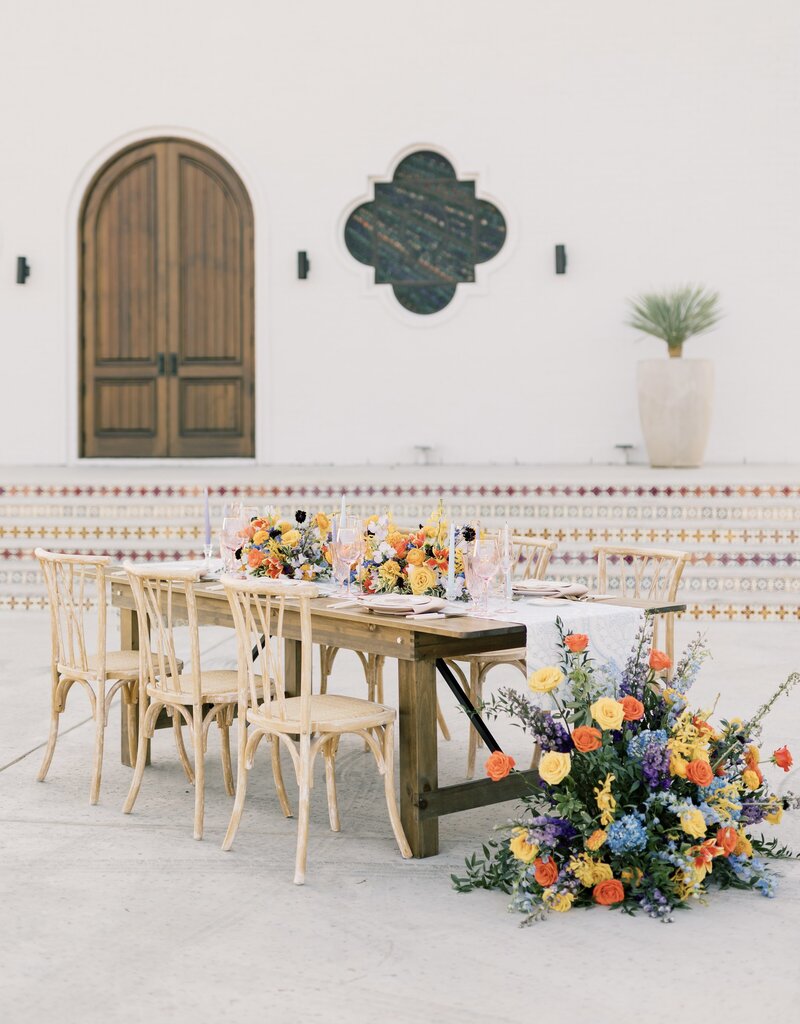 Welcome wedding reception area with exquisite floral designs.