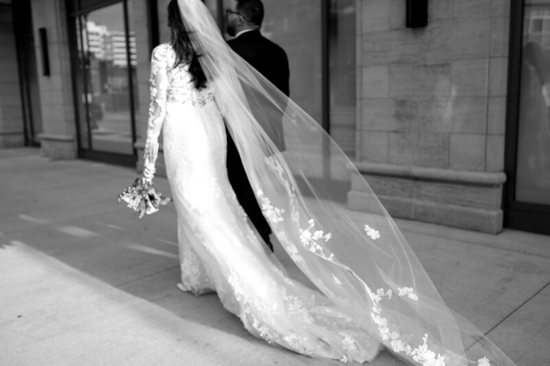 black and white photo of wedding couple in the woods