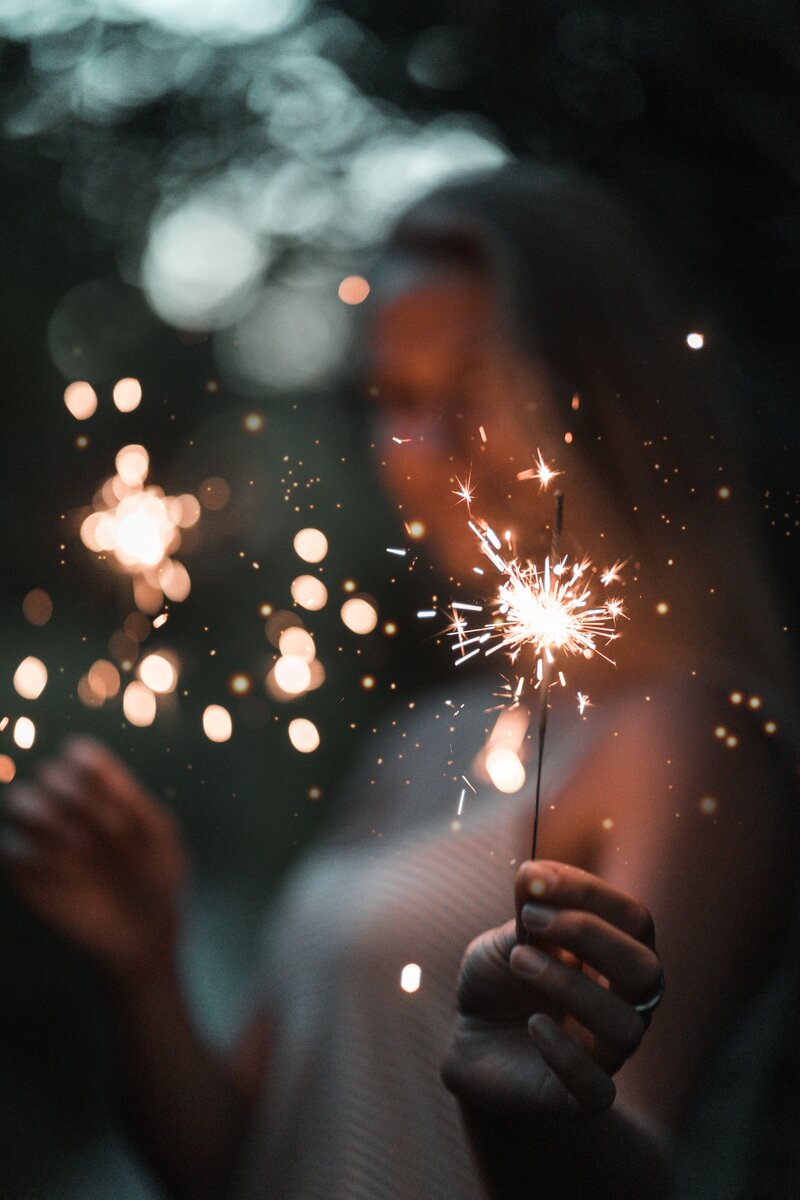 Hand holding sparkler