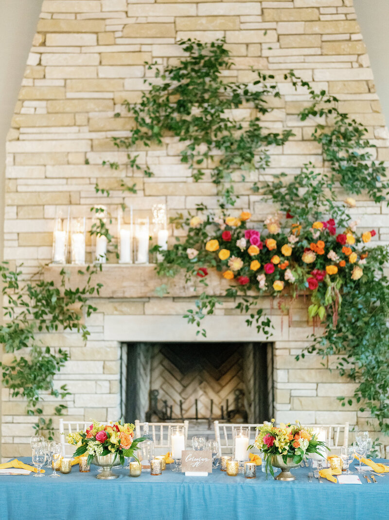 Reception decor in Canyonwood Ridge hall with romantic lighting and Hill Country details