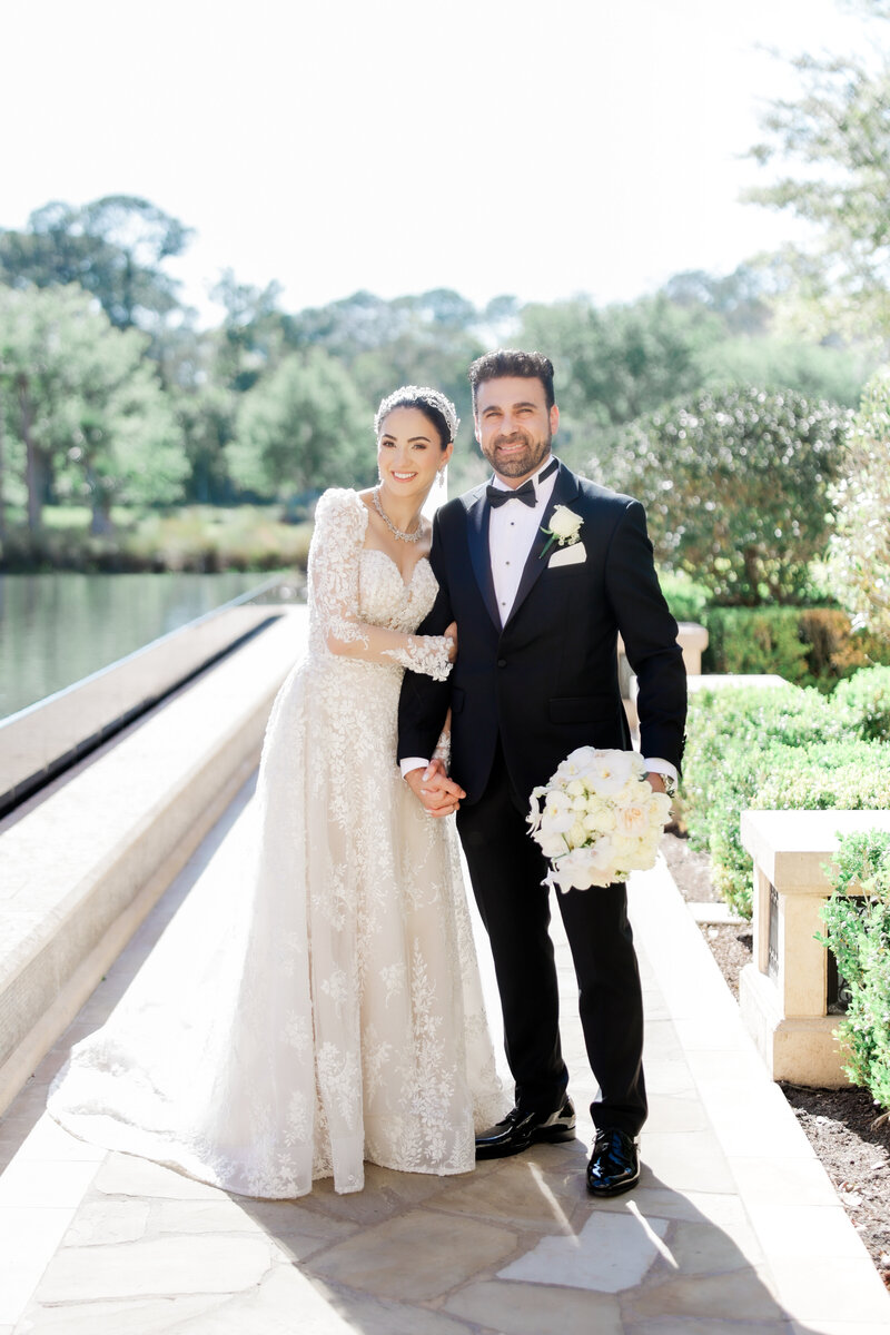 Bride and groom portrait at a wedding at the four seasons Orlando by Florida wedding photographer.