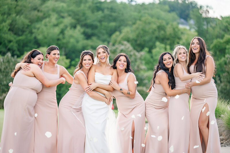 bride and bridesmaids celebrating in pittsburgh wedding