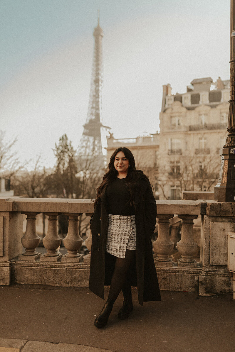 Makeup Artist in  front of the Eiffel Tower in Paris, France